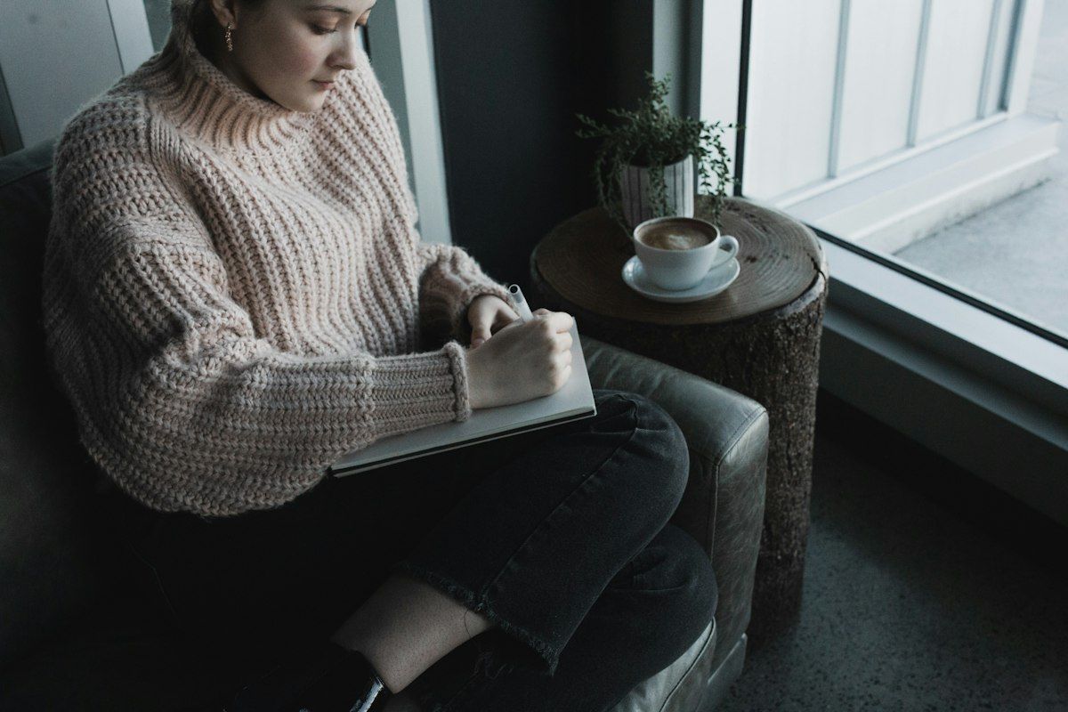 Woman reading in a calm living room
